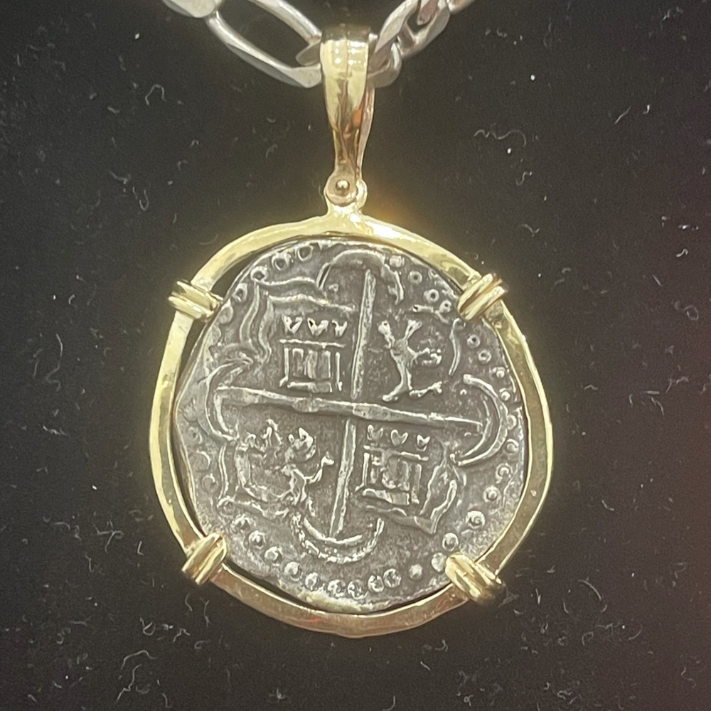 Atocha shipwreck treasure Mel fisher silver coin pendant in 14kt gold bezel